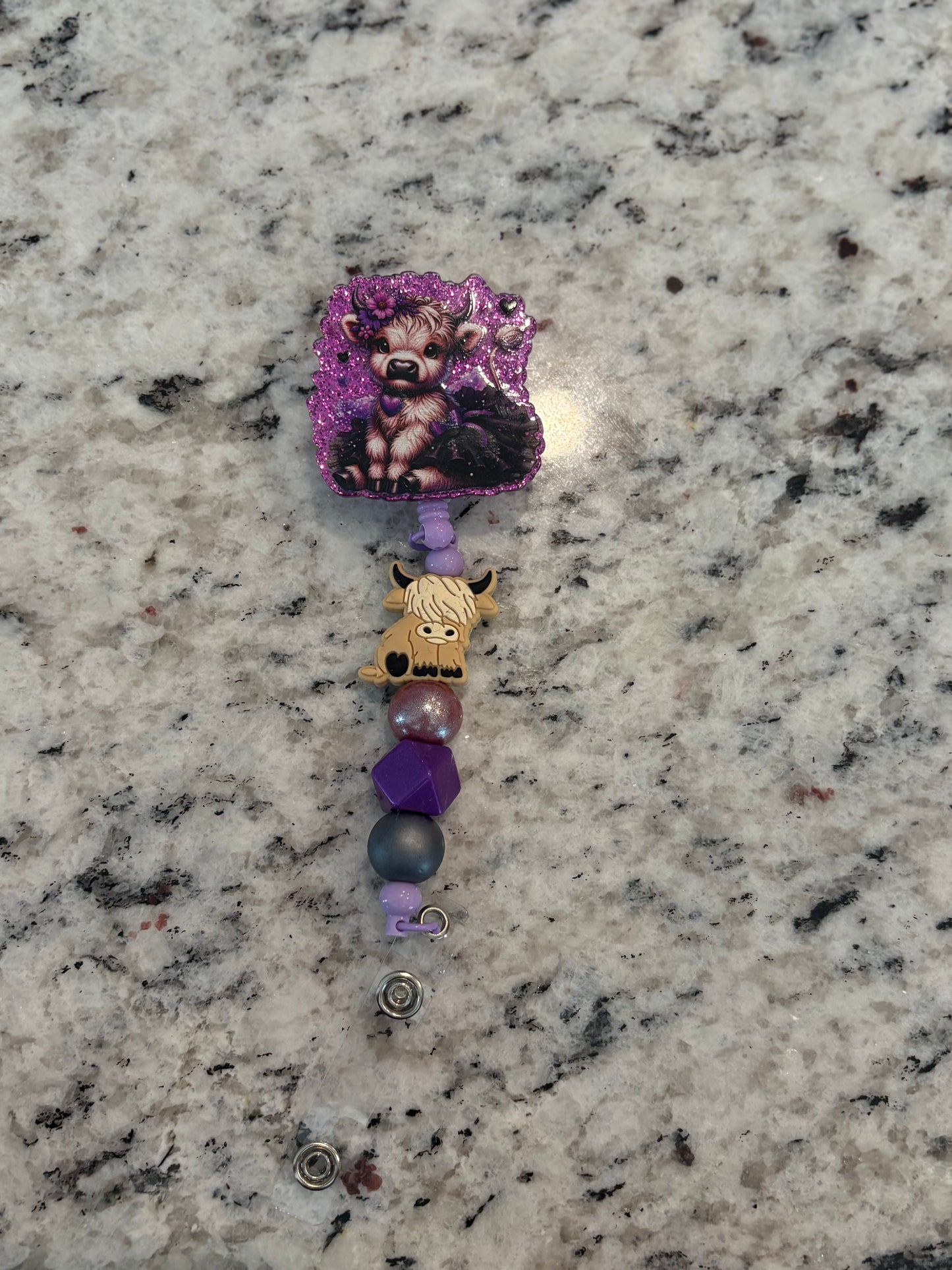 Purple Cow Badge Reel